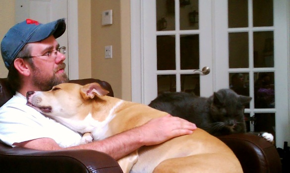Hubby getting some serious love from Ralphie and Tig.