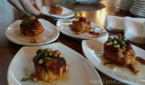 Island Barbeque Scallops, topped with Applewood smoked bacon, toasted pine nuts and chimichurri drizzle.